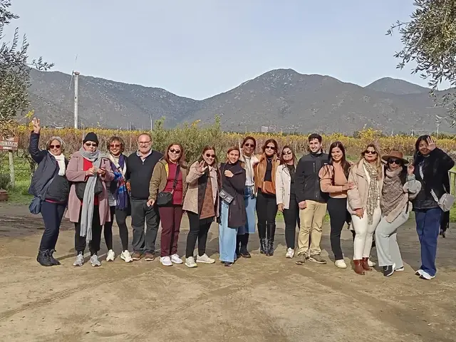 Group among the vineyards of the Casablanca Valley with the mountains behind